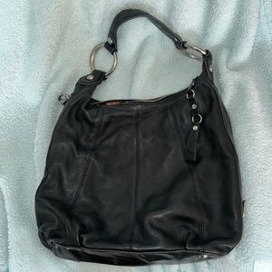 ALL BLACK B.MAKOWSKY PURSE CHEETA PRINT ON THE INSIDE.